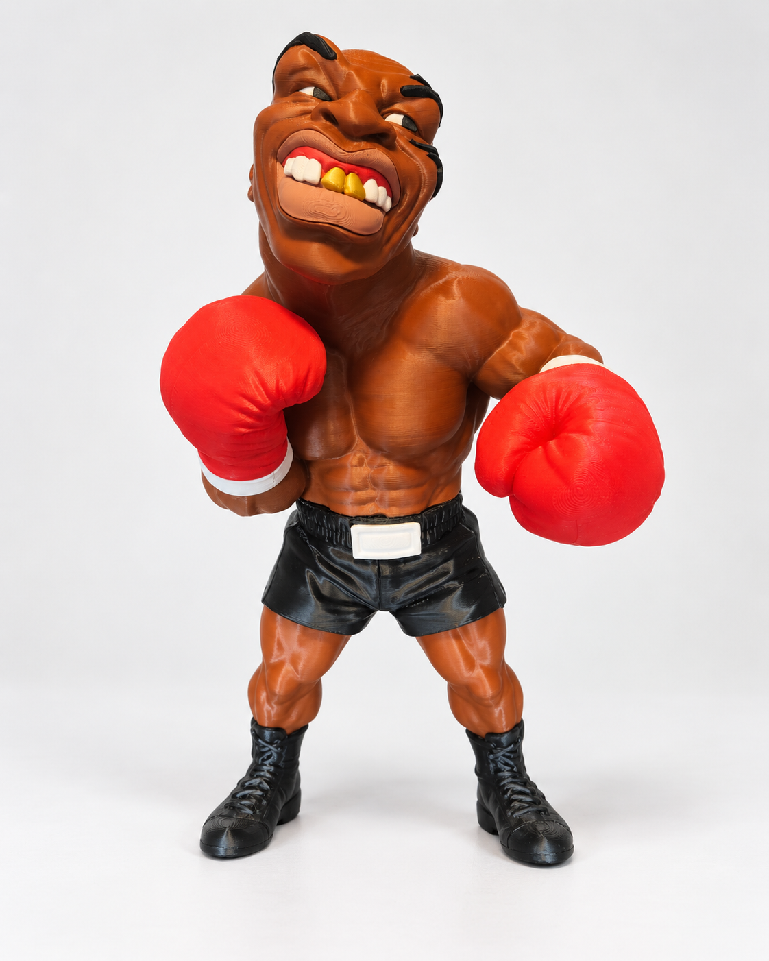 Freestanding 3D printed boxer caricature figure, front angled view