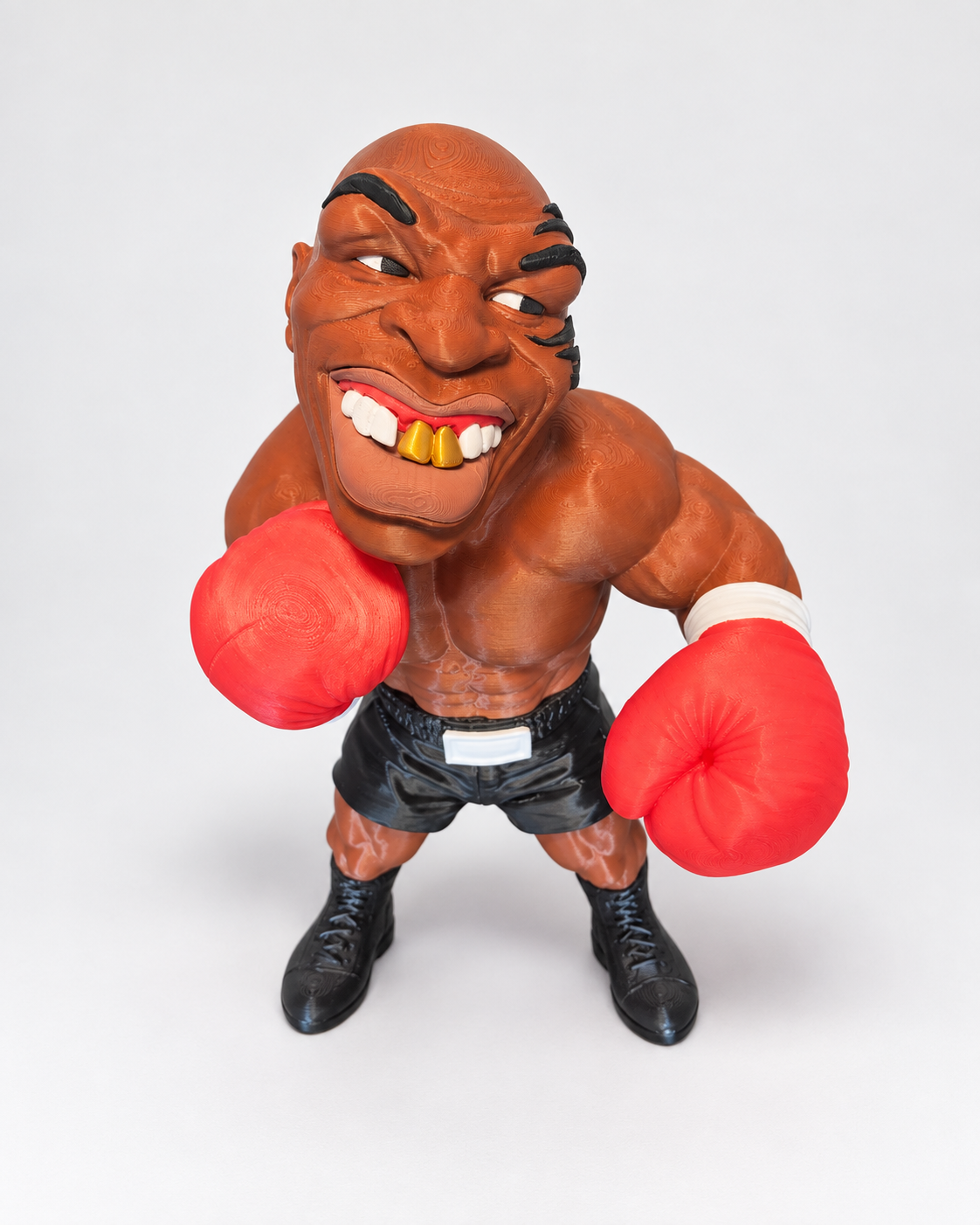 Freestanding 3D printed boxer caricature figure, high angled view