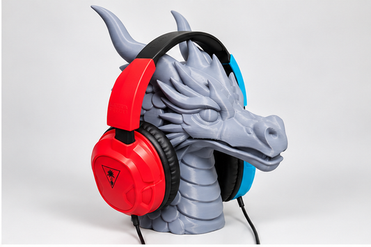 3D printed dragon headphone stand holding a gaming headset, angled view