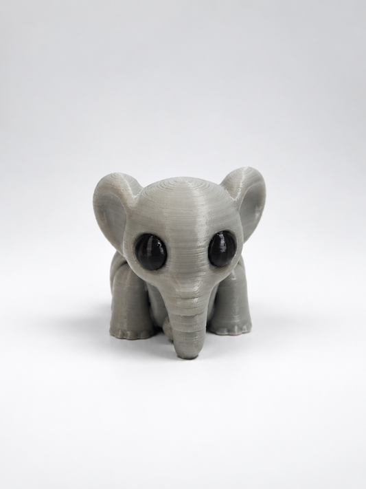 Grey articulated elephant Pocket Pal front view with large ears and black eyes