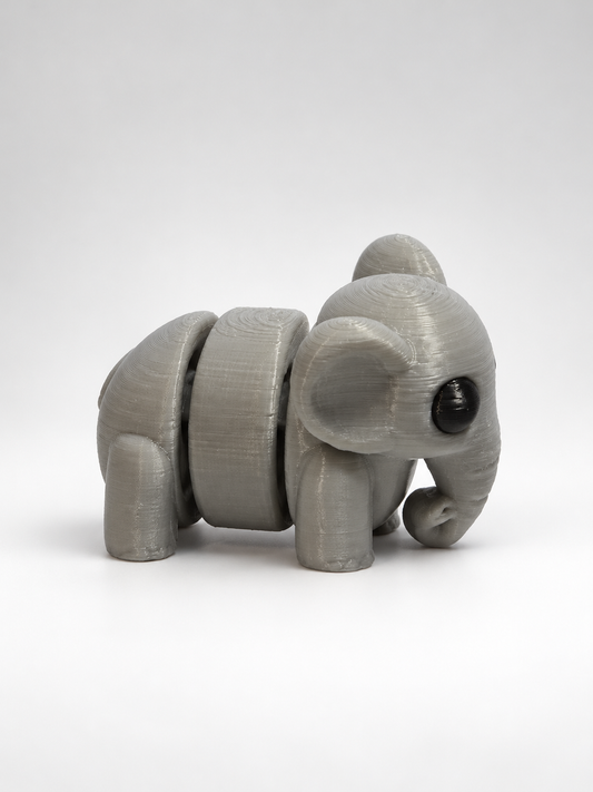 Grey articulated elephant side view highlighting segmented body
