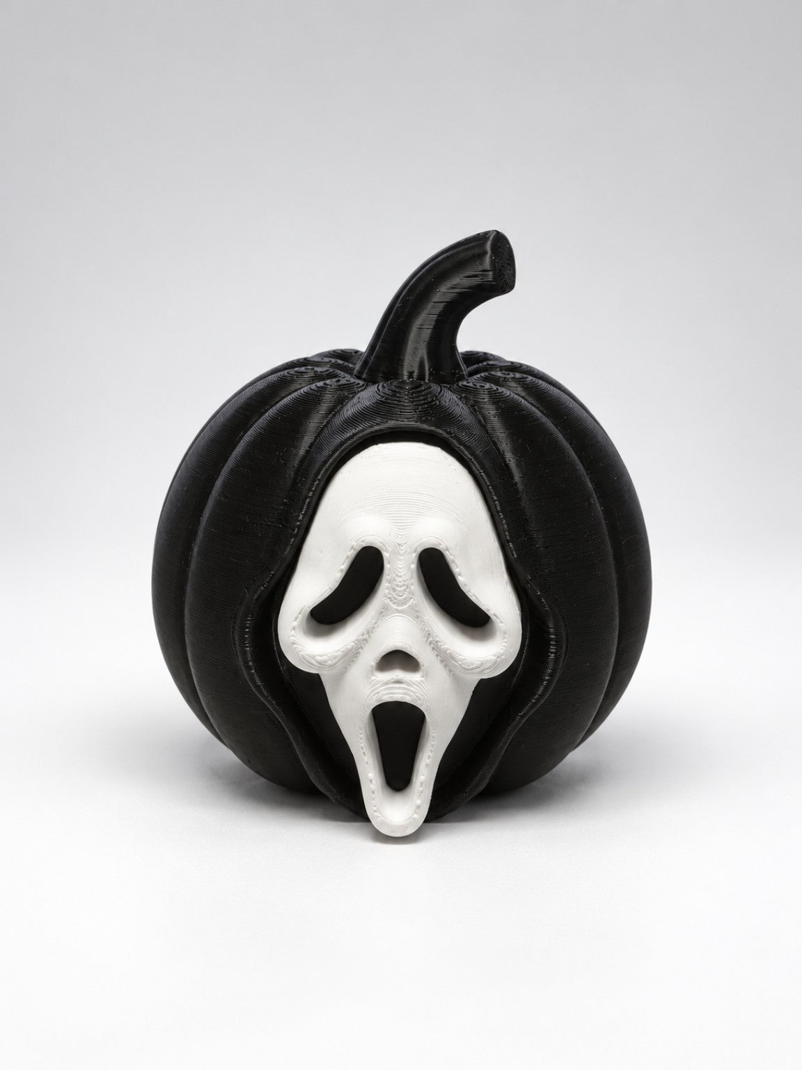 Black 3D printed screaming ghost pumpkin Halloween decoration front view
